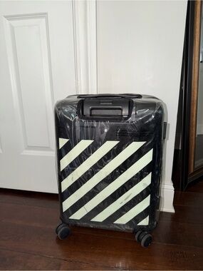 OFF-WHITE BRAND “FOR TRAVEL” SUITCASE